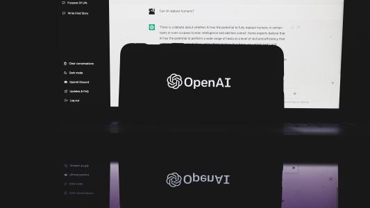 OpenAI logo on a screen